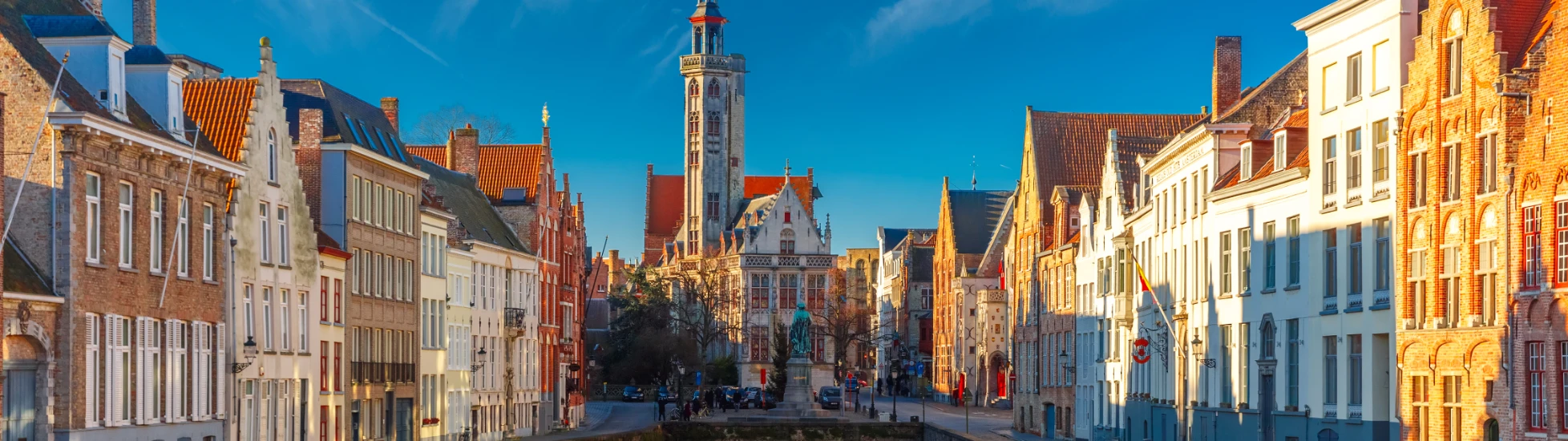 Spiegelrei canal and Jan Van Eyck Square in the morning in Bruges, Belgium