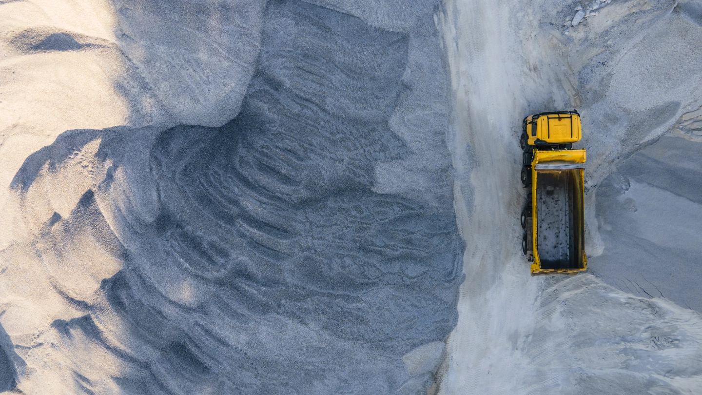 Overhead view of construction vehicle in a quarry Overhead view of construction vehicle in a quarry